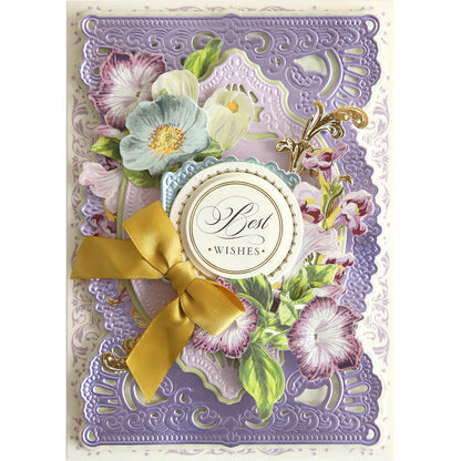 A stunning card adorned with beautiful purple flowers and a delicate bow, created using the gift of life and enhanced with Beautiful Birthday Dies - 3D cut and emboss dies.