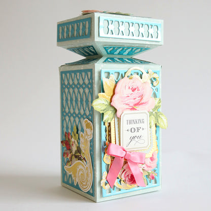 A fragrant Perfume Box Dies adorned with beautiful flowers - a perfect gift for loved ones.