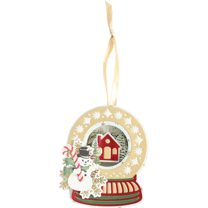 A holiday ornament with Heirloom Ornaments Dies on it.