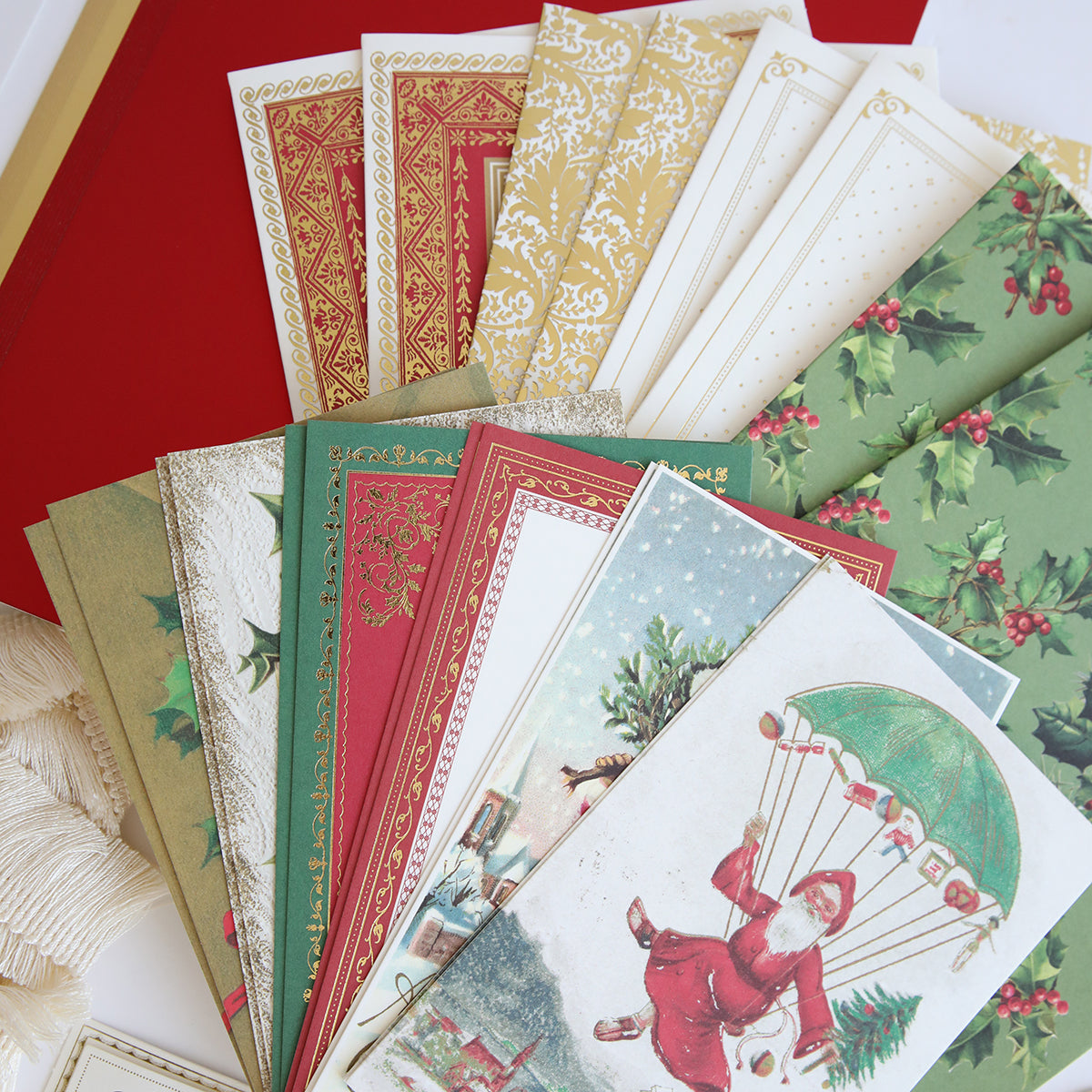A collection of Anna Griffin Victorian Christmas Class Materials and Dies featuring Santa Claus.