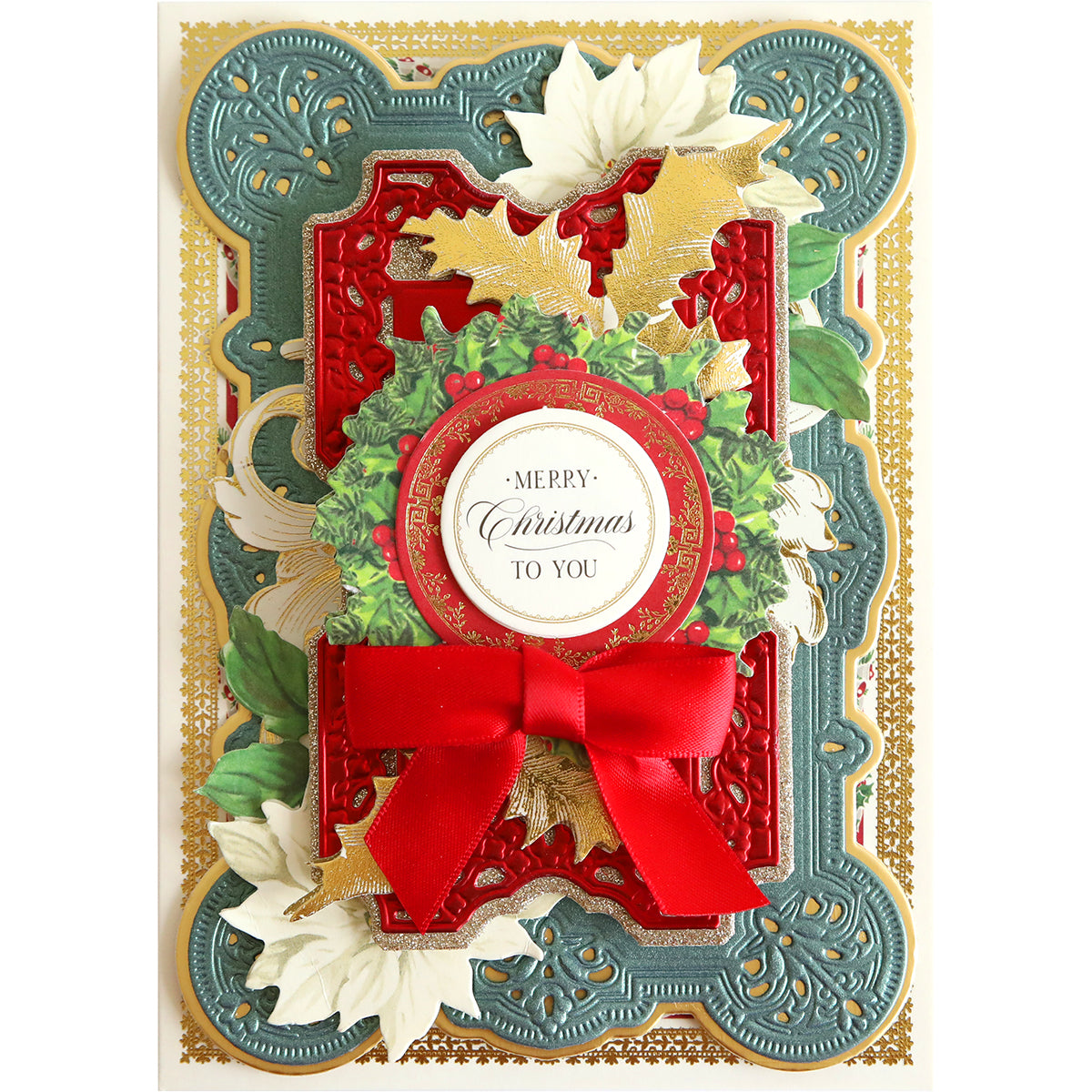 A Victorian Christmas card with a festive wreath and bow can be created using the Victorian Christmas Dies.