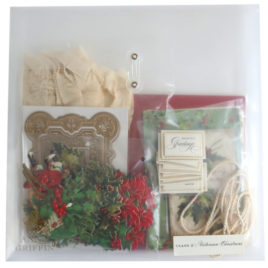 A clear plastic bag with holly, ribbon and Victorian Christmas Class Materials and Dies.