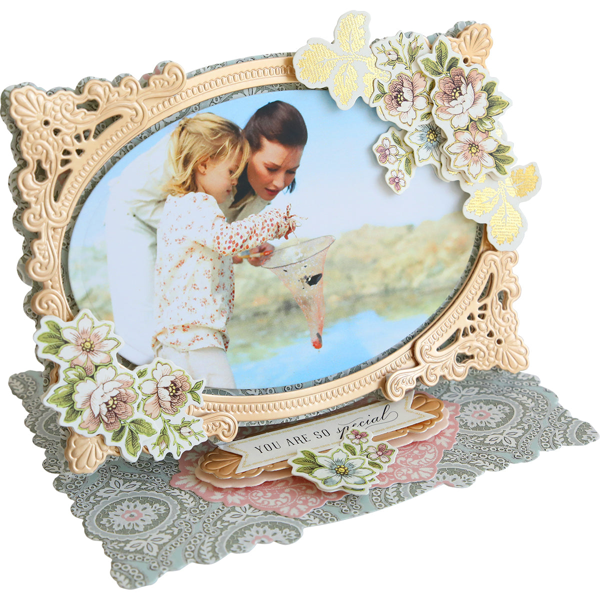 An Anna Griffin Photo Finish Easel Card Dies featuring a family photo of a girl and a boy.
