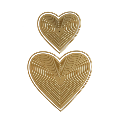 Two Japanese inspired gold heart shapes created with Heart Kirigami Dies on a white background.