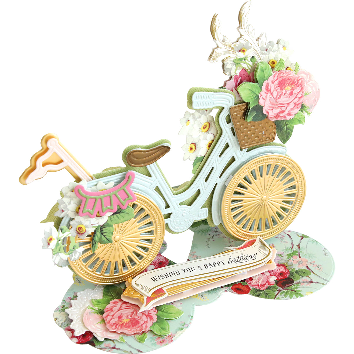 A decorative 3D Bicycle Easel Die featuring a pastel-colored bicycle with a basket of flowers and the message "wishing you a happy birthday!" printed on an easel die set base that resembles floral plates.