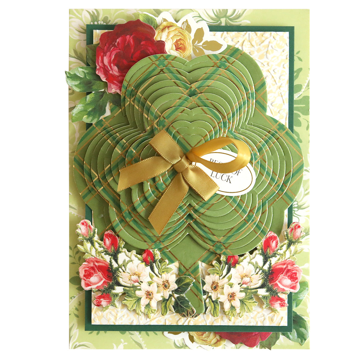 A Shamrock Kirigami Dies adorned with flowers and ribbons, perfect for St. Patrick's Day celebrations.