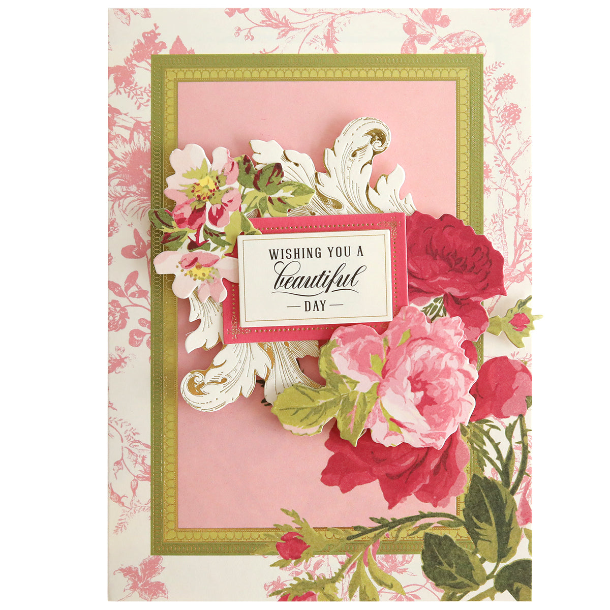 Greeting card featuring floral design with roses and a message "wishing you a beautiful day" framed by ornate white patterns on a pink background from the Folded Flower Birthday Card Kit.