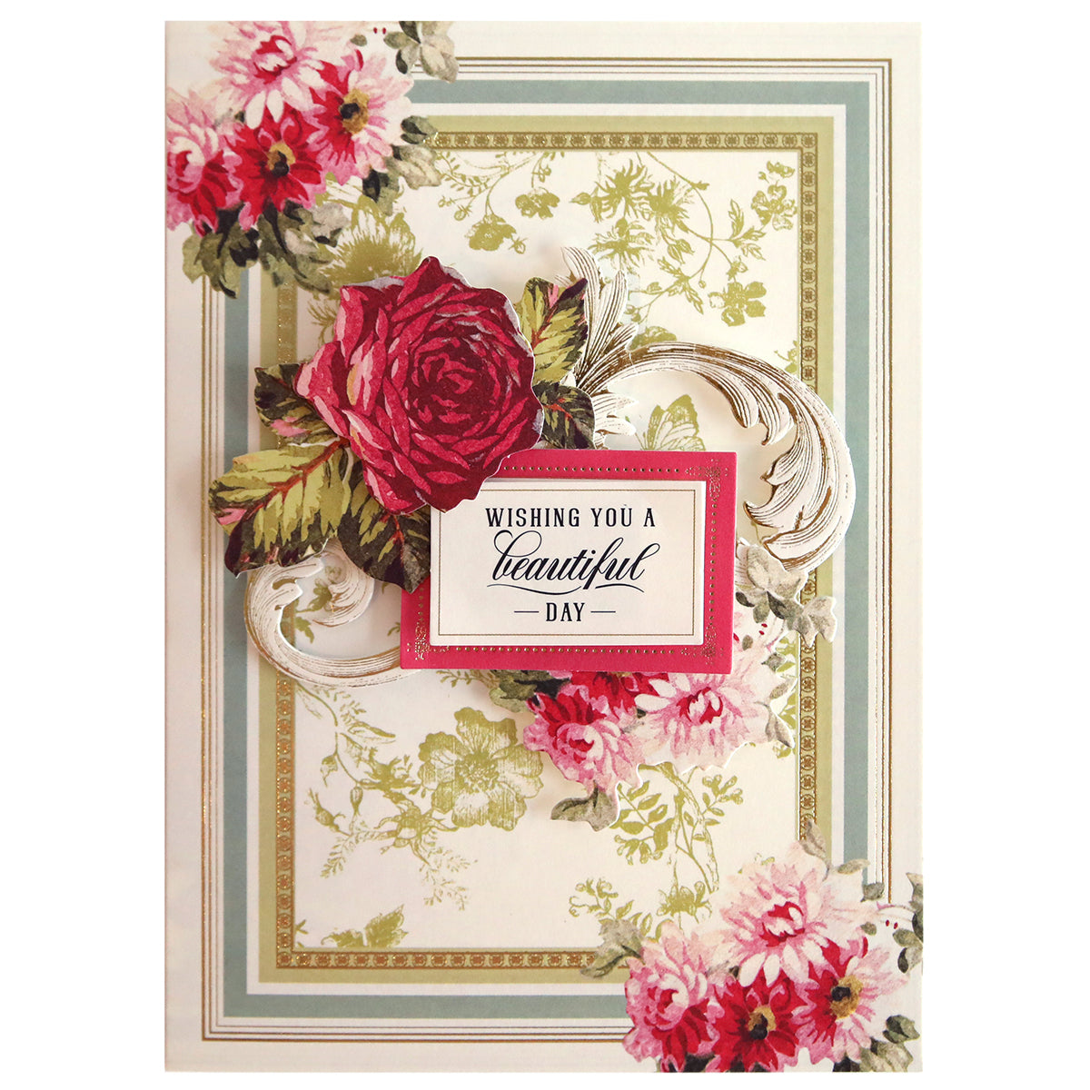 A Folded Flower Birthday Card Kit featuring floral patterns, a central ornate golden swirl design, and the message "wishing you a beautiful day" framed in a pink box.