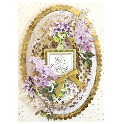 A purple and gold card with lilacs on it, made using Scallop Compendium Dies.