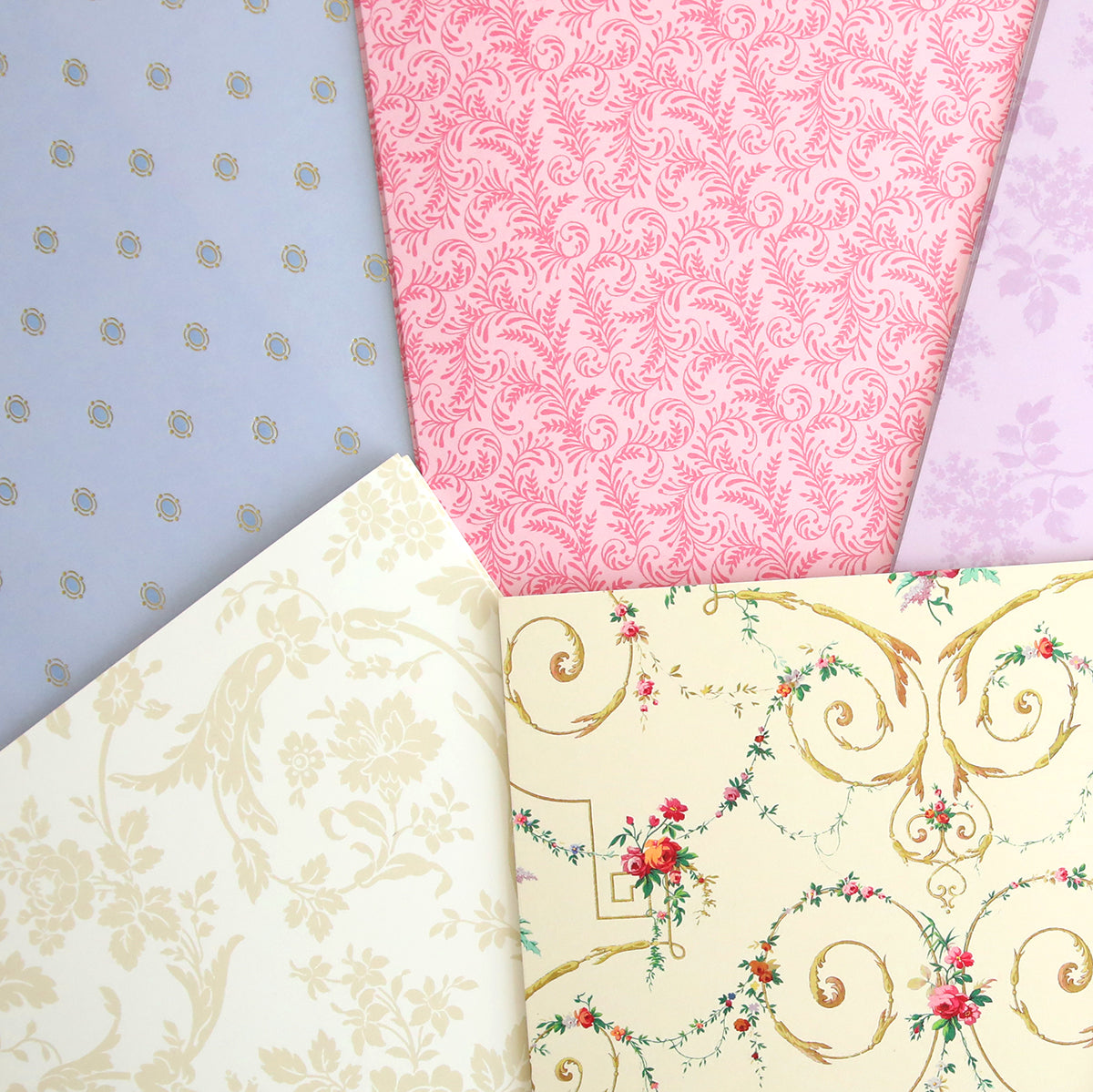 An assortment of decorative wallpapers with various patterns and colors from Astrid 8x12 Doublesided 300gsm Cardstock design.