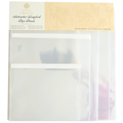 Packaging of Interactive Scrapbook Page Panels, featuring clear plastic sleeves and decorative, floral-themed labeling.