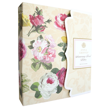 A decorative box with floral designs on a beige background. The box has a label that reads "Anna Griffin" and "Anniversary Floral Stickers.