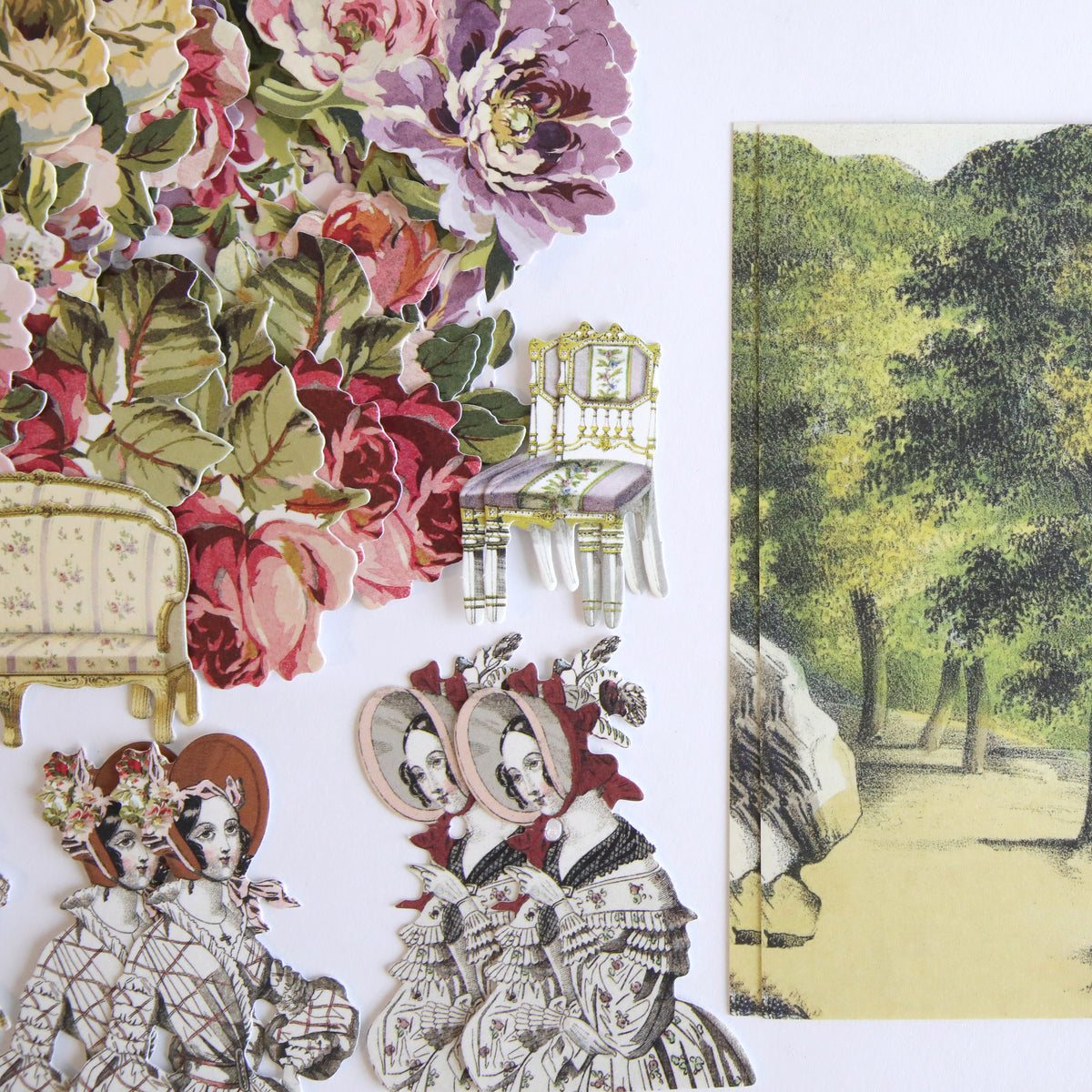 Theatrical Greetings Encore Set die-cut paper ephemera featuring floral clusters, Victorian furniture, and women in historical dresses alongside a wooded landscape print.