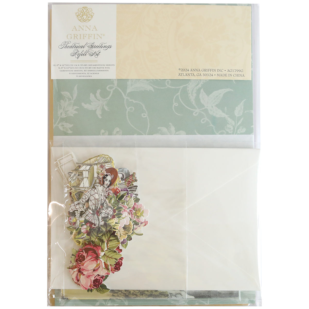 The Theatrical Greetings Refill Kit includes a stationery set featuring floral designs, envelopes, and decorative embellishments in a clear package.