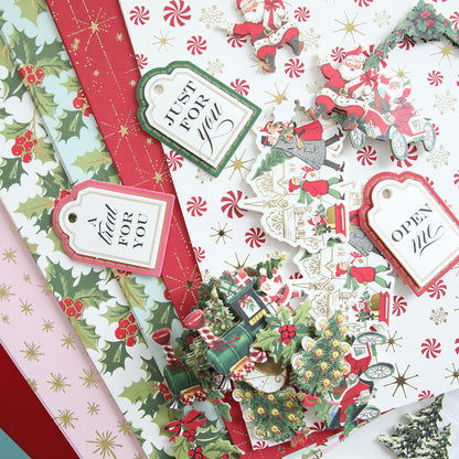 The Treat Boxes Refill Kit includes a range of festive paper designs showcasing holly, candy canes, and assorted tags with phrases such as "Just for You" and "Open Me," complete with cut-out illustrations of Santa and trees.