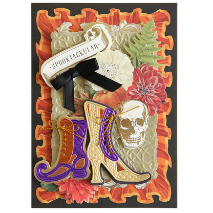 A Halloween-themed card featuring the Witchy Shoes 3D Dies with images of colorful boots, a skull, flowers, and the text “Spooktacular” on a decorated background – perfect for your fashionista friends who love Halloween cards.