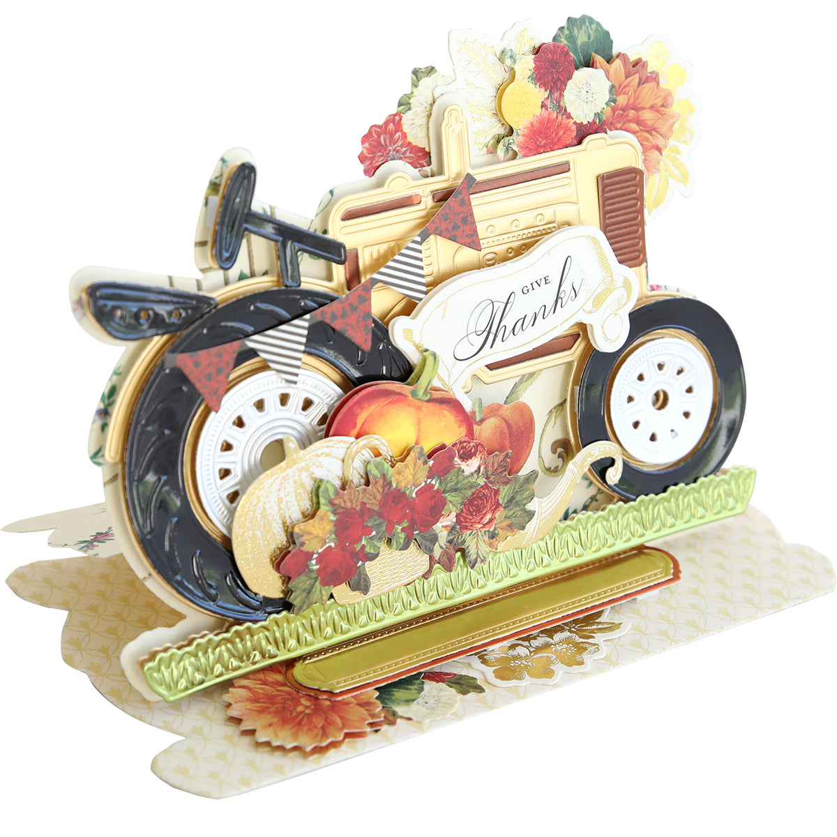 Using the Tractor Easel Dies, you can create a charming 3D card that spotlights a vintage tractor adorned with flowers, fruits, and a "Give Thanks" sign. Meticulously designed with 12 dies for intricate details, this delightful card is arranged on a patterned base and features an elegant tractor easel die to enhance its farm ride theme.