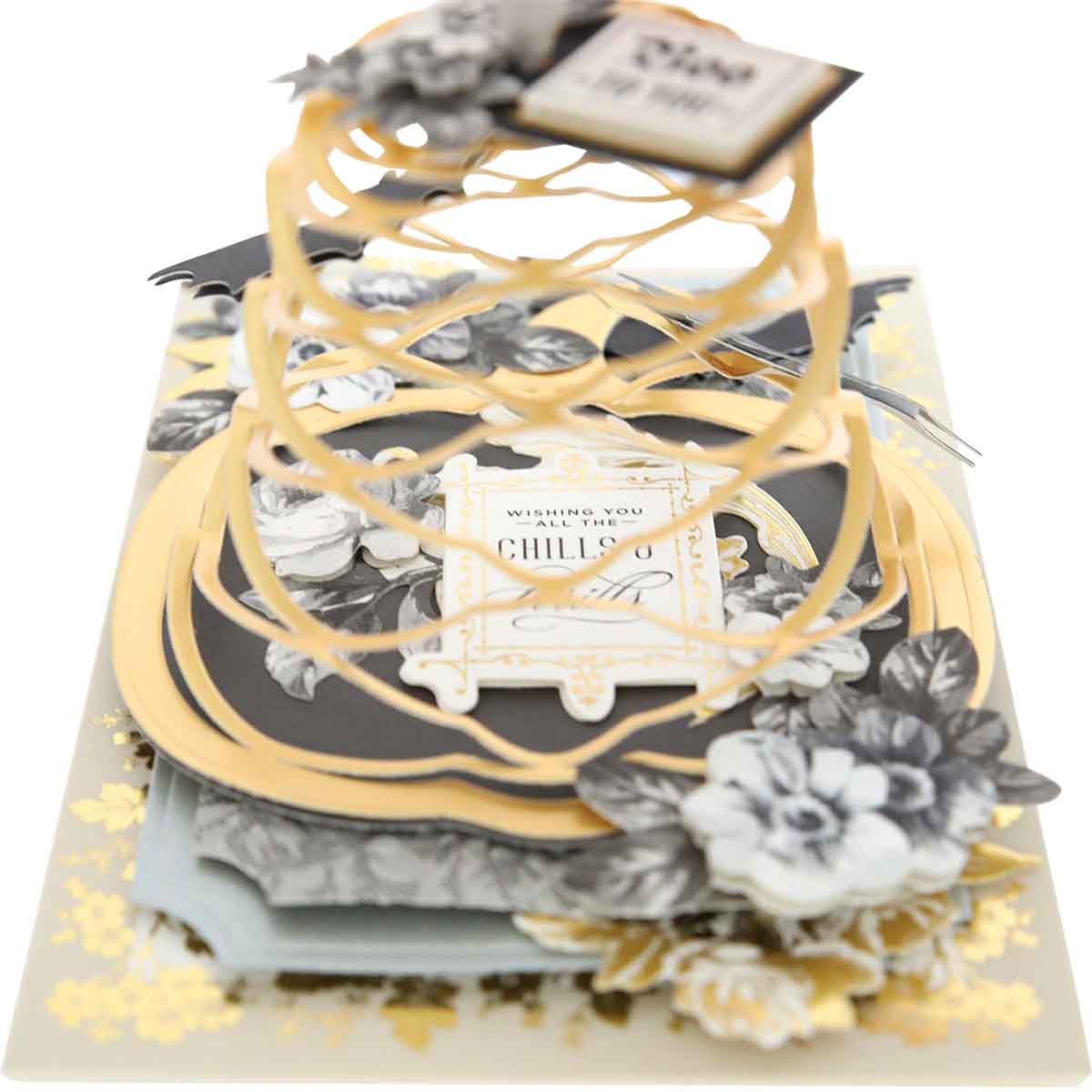 A detailed pop-up greeting card featuring intricate die-cut layers created with Pumpkin Kirigami Dies, adorned with ornate floral decorations, and a message that reads "Wishing You Happiness and Cheer.