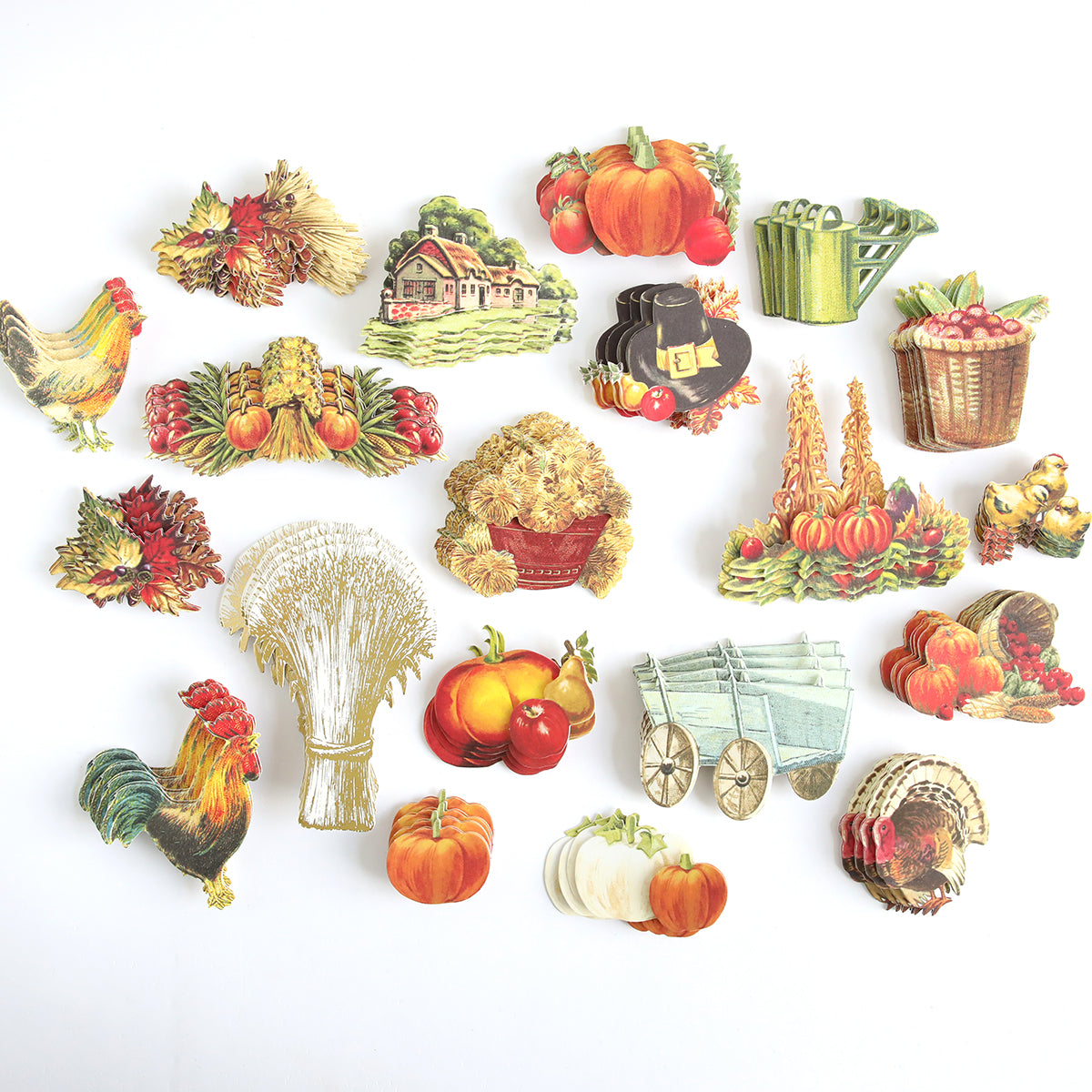 The Harvest Embellishment Stickers feature a collection of vintage-style harvest-themed cutouts with rustic charm, including pumpkins, turkeys, roosters, corn, a farmhouse, a pilgrim hat, and a wagon all arranged on a plain white background.