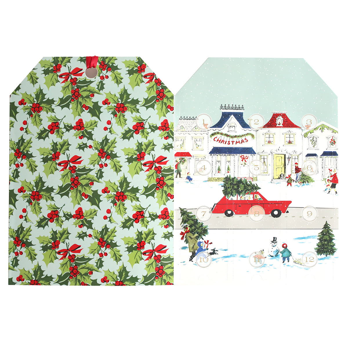 Two Christmas-themed envelopes from the Creative Tags Advent Calendar: one adorned with holly and berries, and the other showcasing a picturesque winter village scene featuring a car and snowman.