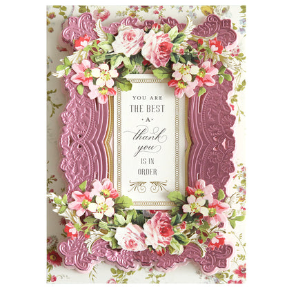 An ornate thank you card features a pink embossed frame and floral border with center text: "You are the best. A thank you is in order." This elegant design, inspired by 3D Filigree Concentric Dies, creates a layered and heartfelt expression of gratitude.