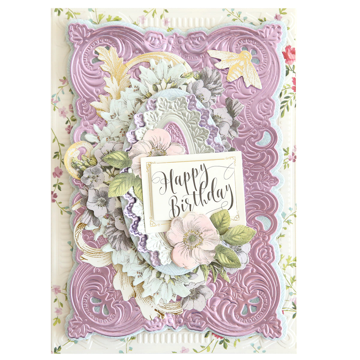 A layered birthday card featuring embossed purple and white frames made with 3D Baroque Concentric Dies, floral accents, and a “Happy Birthday” sentiment in elegant script at the center.