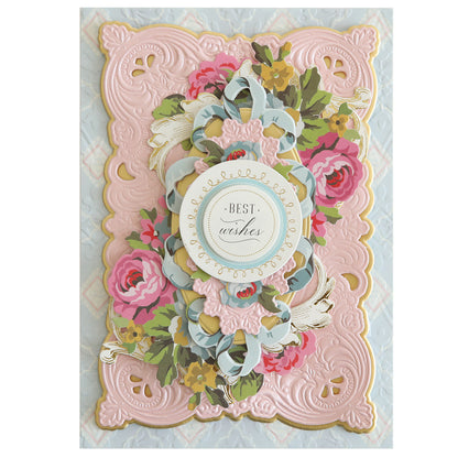 Showcase your favorite craft projects using the 3D Baroque Concentric Dies—ideal for creating decorative cards with ornate pink, gold, and floral designs and a "Best wishes" sentiment in the center.