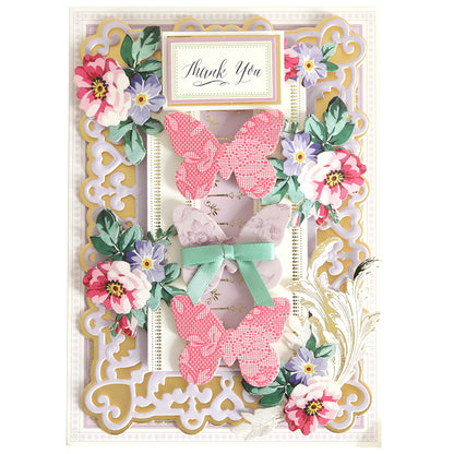 Decorative card featuring Paper Butterfly Embellishments, intricate floral designs, and ornate pastel-colored borders.