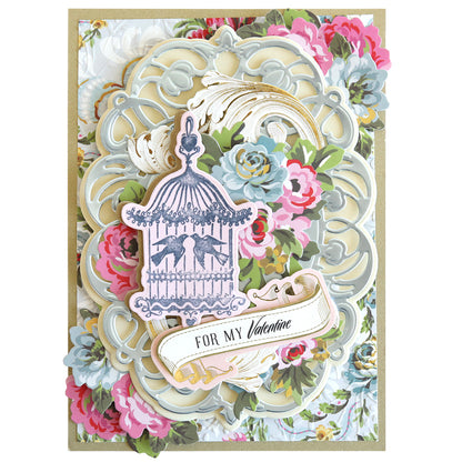 This exquisite product showcases the artistry of Smitten Stamps in the form of an ornate card, complete with a layered floral design, a birdcage illustration, and an elegant script scroll reading "For My Valentine." It's perfect for crafting projects.