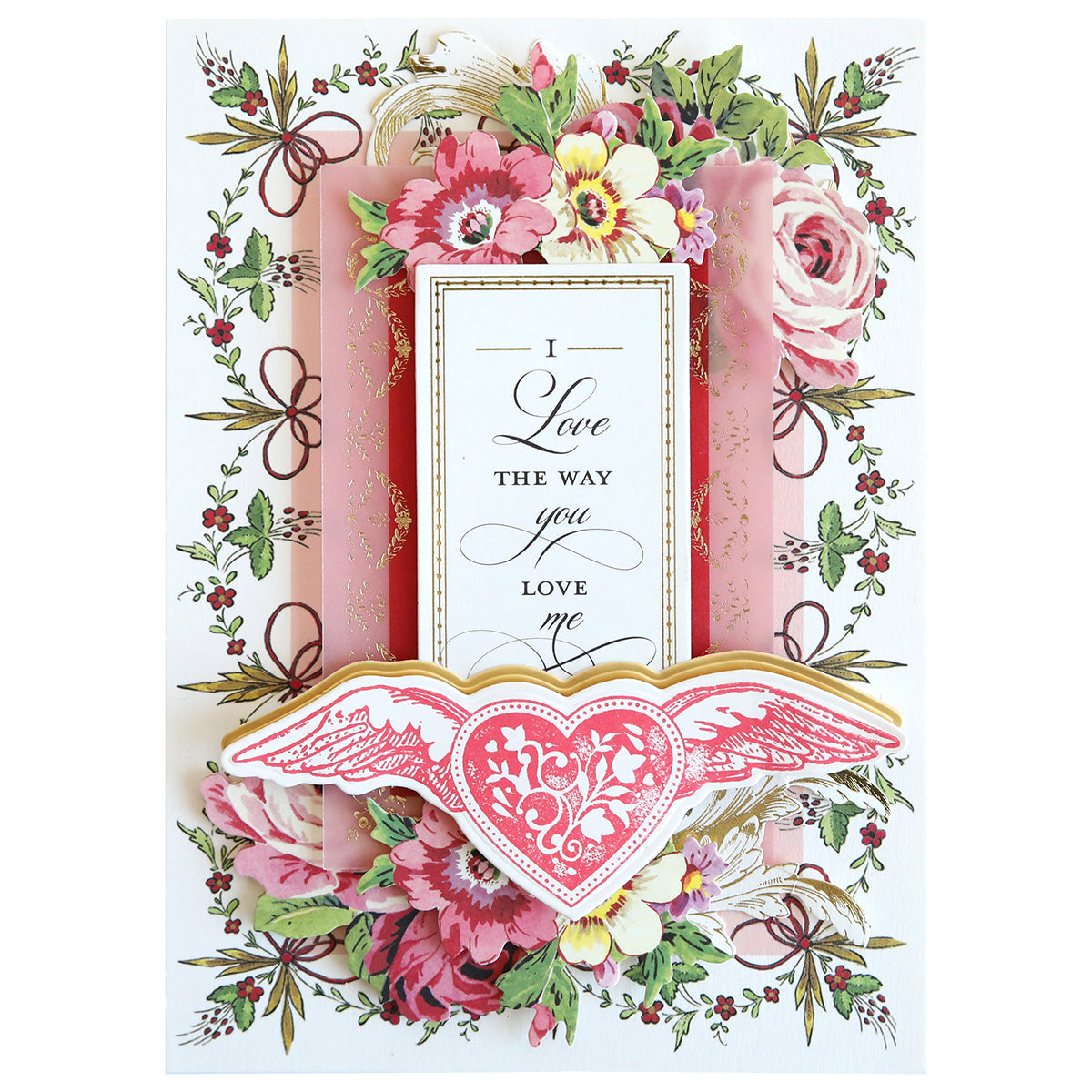 Greeting card with a floral theme showcasing pink and white flowers with decorative gold accents, complete with a heartfelt message, "I love the way you love me," adorned with a winged heart design. Ideal for crafting projects using Smitten Stamps and Dies.