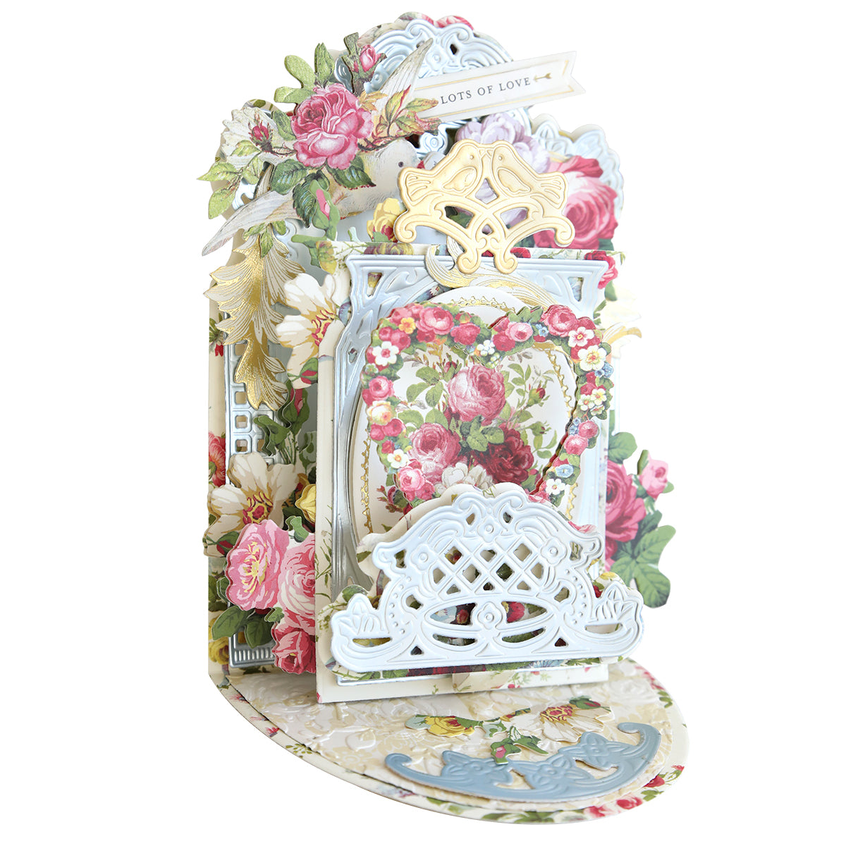 The "Interactive Pulley Dies" card showcases intricately detailed floral designs with roses and an ornate "Lots of Love" message. Featuring a moveable element, it adds extra charm to your heartfelt greetings.