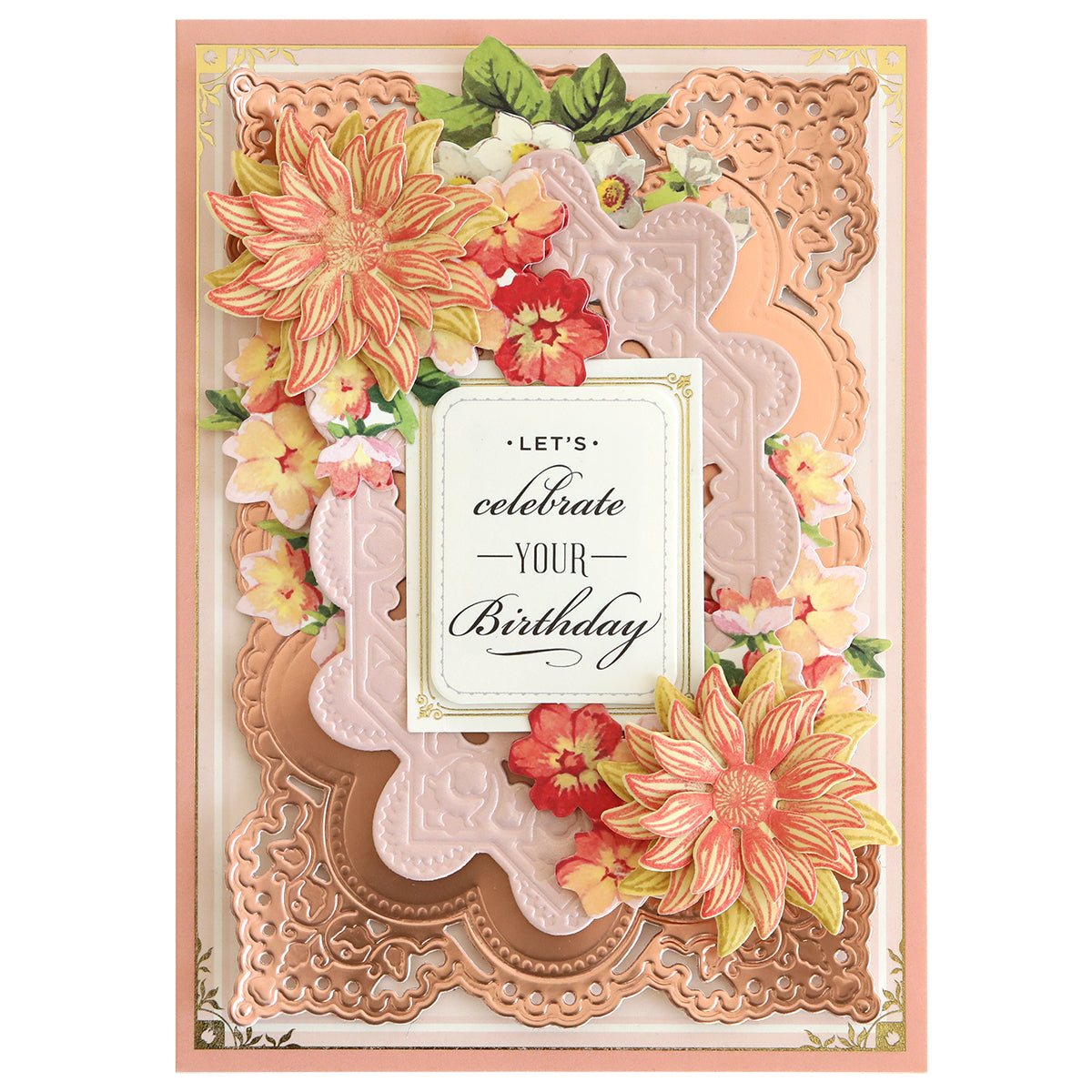 A birthday card featuring ornate pink and gold embossed layers and floral accents made with the Blooms Flower Mold, Stamps and Dies, plus the greeting: “Let’s celebrate your birthday” in the center.