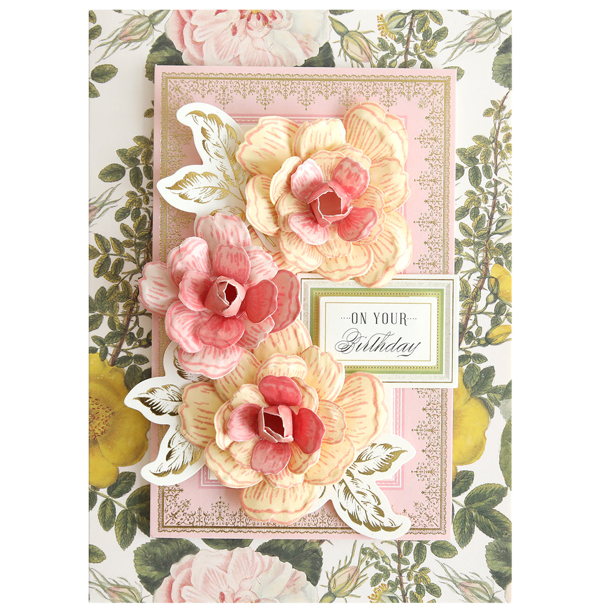A decorative birthday card made with the Posies Flower Mold, Stamps and Dies, featuring three large pink and yellow flowers, green leaves, and an "On Your Birthday" label on a floral background.