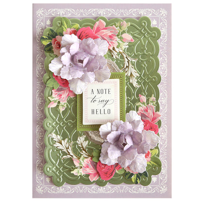 A decorative card made with Posies Flower Mold, Stamps and Dies features ornate green and white borders, pink and purple paper-crafted flowers, and a center label that reads “A note to say hello.”.