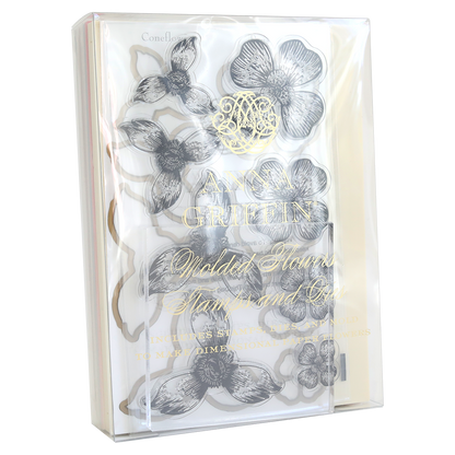 The "Blossoms Mold, Stamps and Dies" comes in a clear packet with floral stencil designs and a gold-embossed "Anna Griffin" label. It's perfect for coordinating with paper flowers to create elegant crafts.