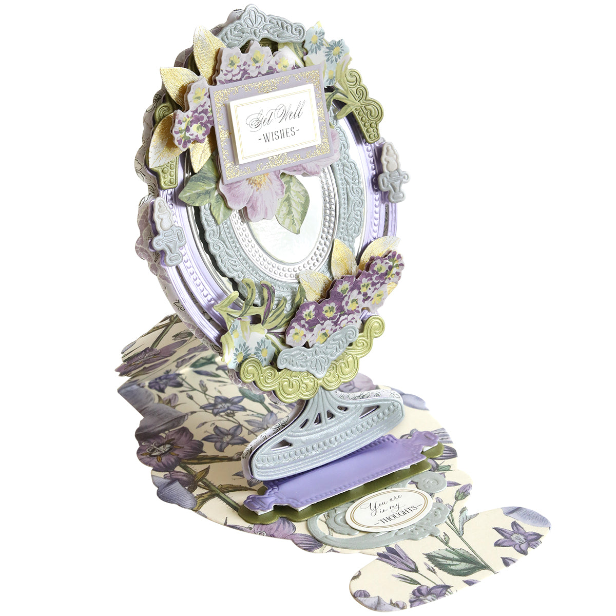 A decorative "Get Well Wishes" card for special occasions, featuring floral designs in layered purple and green, crafted using Mirror Easel Dies' intricate details.