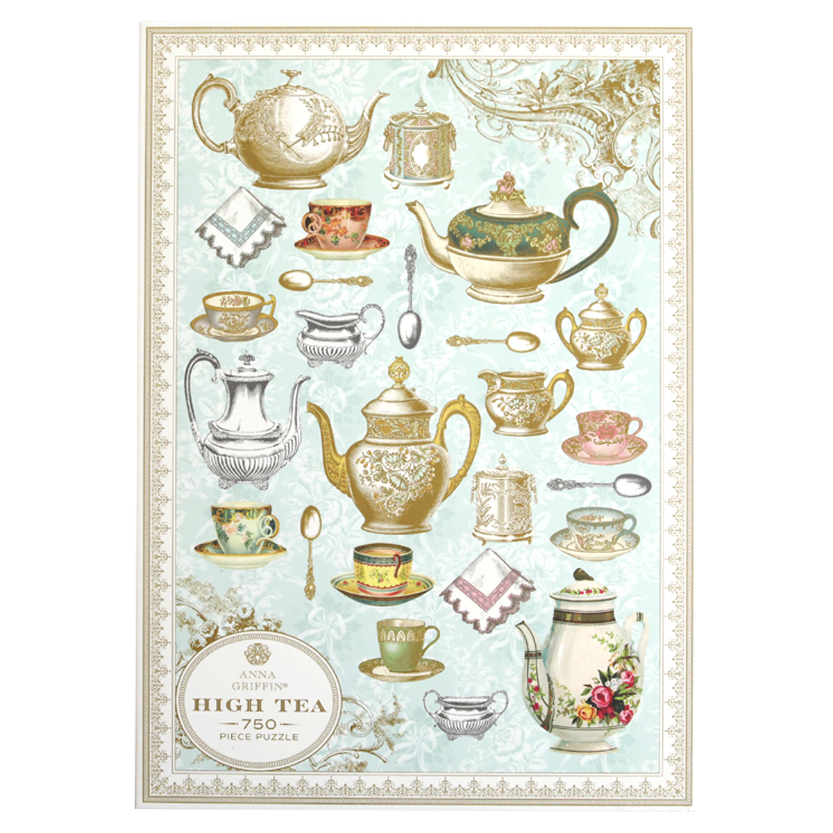 The puzzle box cover features ornate teapots, cups, and silverware illustrations on a light blue background. Text reads "High Tea Jigsaw Puzzle - 750 Piece." Ideal for puzzle lovers and tea enthusiasts.