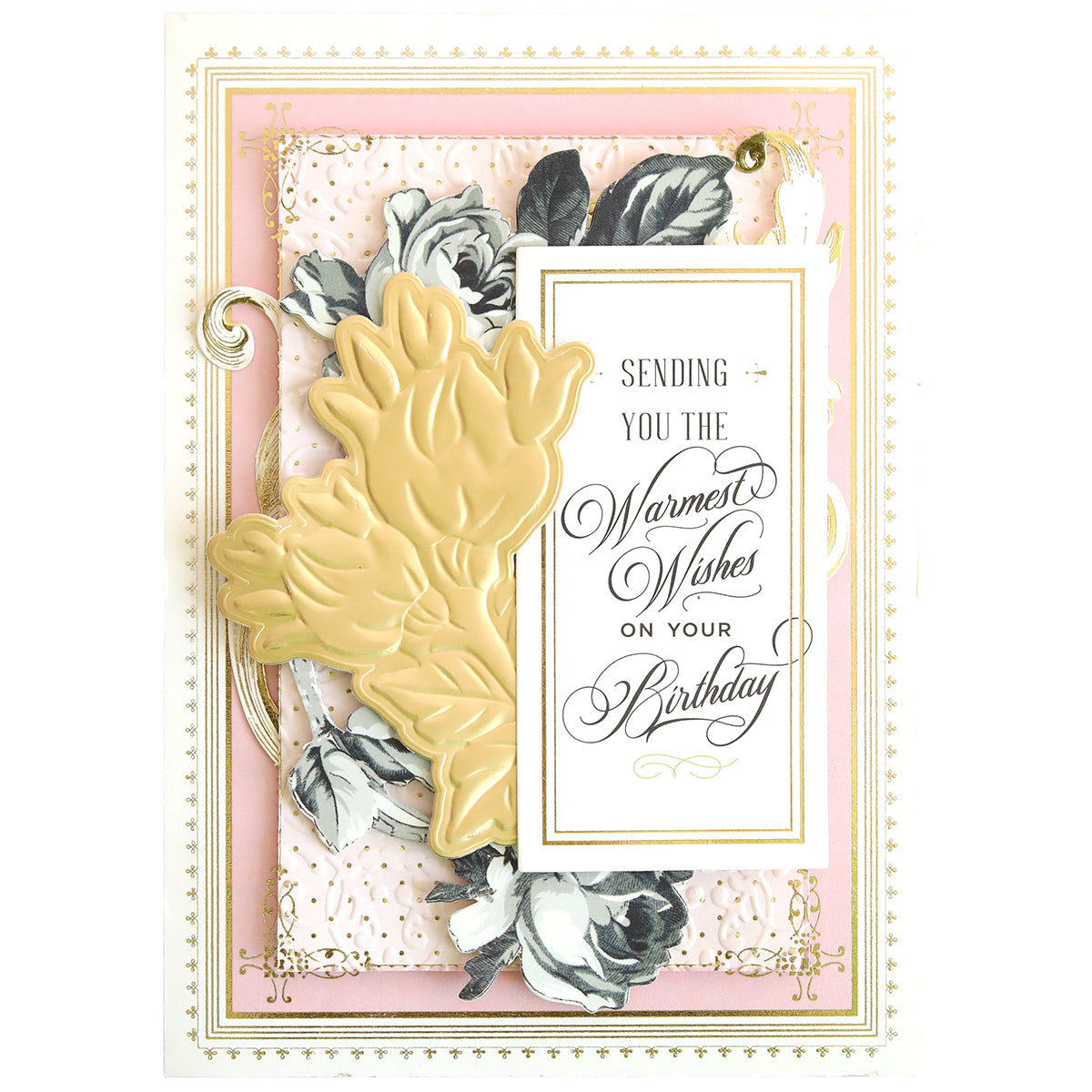 A decorative birthday card featuring embossed yellow flowers and delicate rose buds using the 3D Roses Cut and Emboss Folder Set, with a message: "Sending you the warmest wishes on your birthday," surrounded by floral and scroll designs on a pastel background.