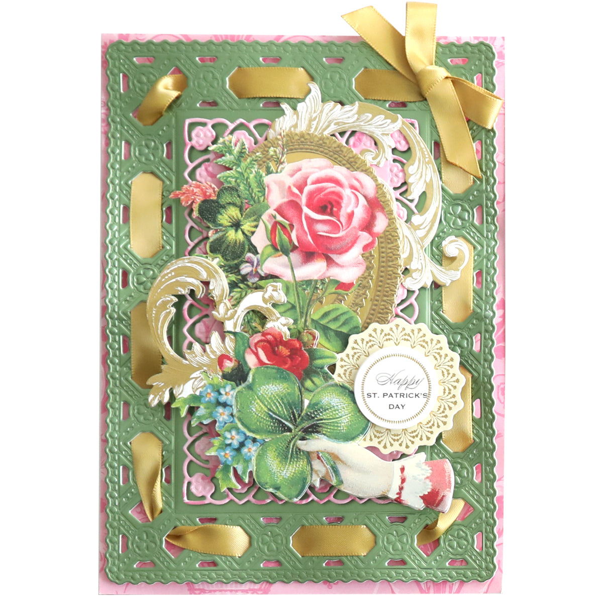 The Lucky Ephemera Stickers add vintage charm to a St. Patrick's Day card adorned with a pink rose, greenery, gold ribbons, and clover. Perfect for enhancing your St. Patrick's Day crafts!.