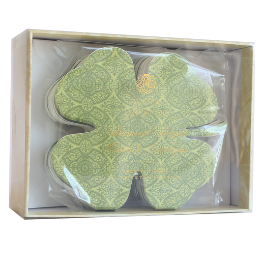 Shamrock-shaped cards and envelopes come beautifully packaged in a transparent box with a beige border, adding St. Patrick's Day charm and good luck to any table setting.