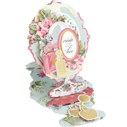 The Mirror Card Craft Box features a detailed card design on double-sided cardstock with floral patterns, perfume bottles, and foil embellishments, including a message: "create a life that you love.