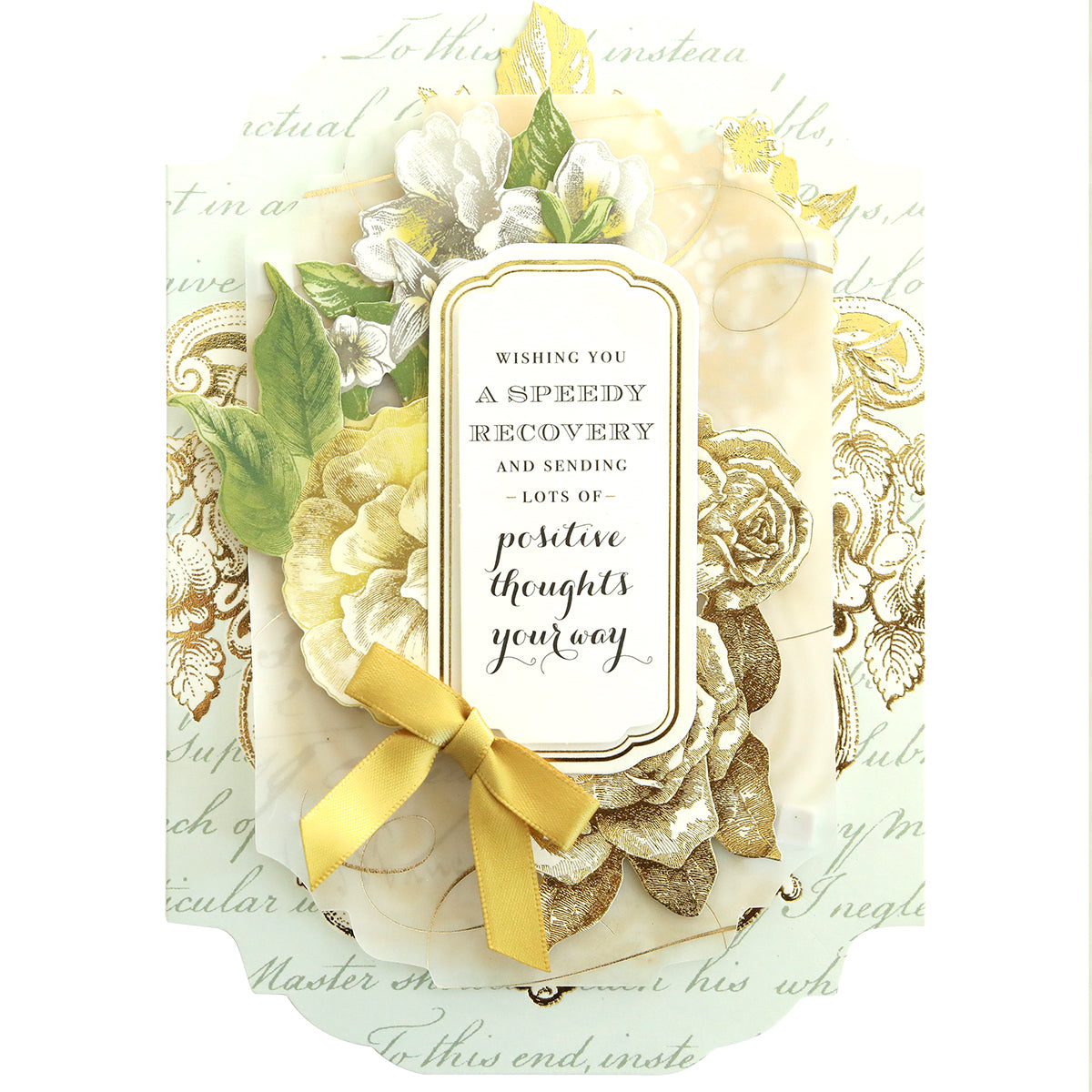 A decorative card from the Simply Get Well Card Making Kit features flowers, a bow, 3D embellishments, and the message: "Wishing you a speedy recovery and sending lots of positive thoughts your way.