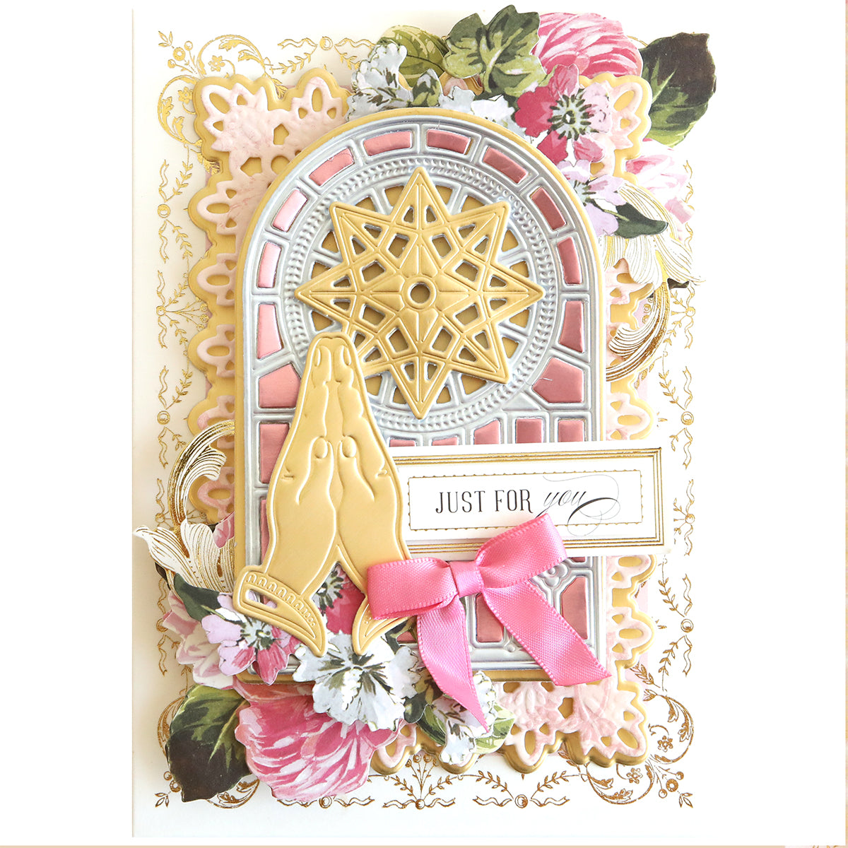 The Praying Hands Dies create ornate greeting cards with embossed hands, a gold star, pink ribbon, and stained glass-inspired florals. The card says "Just for you" and is ideal for religious holidays.