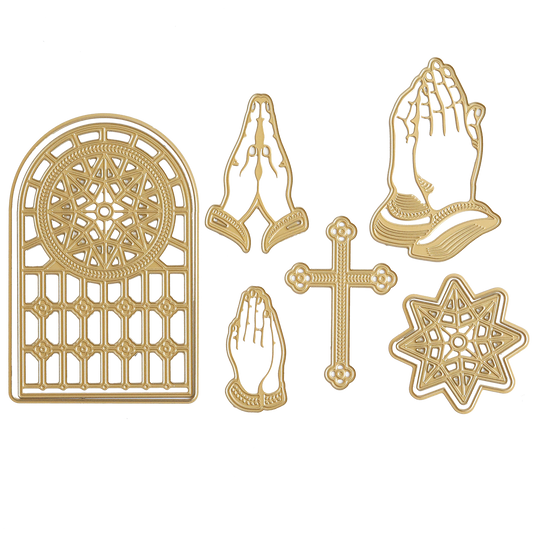 Gold religious symbols, such as the Praying Hands Die, a cross, a stained glass window pattern, and a star shape, are elegantly displayed on a white background.