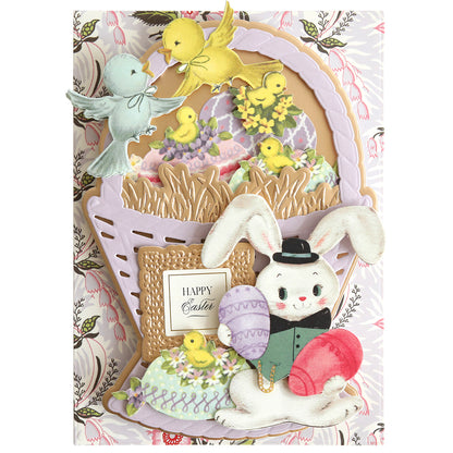 The "Bunnies and Chicks Embellishment Stickers" showcase a bunny with eggs, a bird, and chicks by a basket on a floral background. Featuring "Happy Easter" in elegant letters, it's ideal for spring crafts or enhancing charm when paired with stickers.