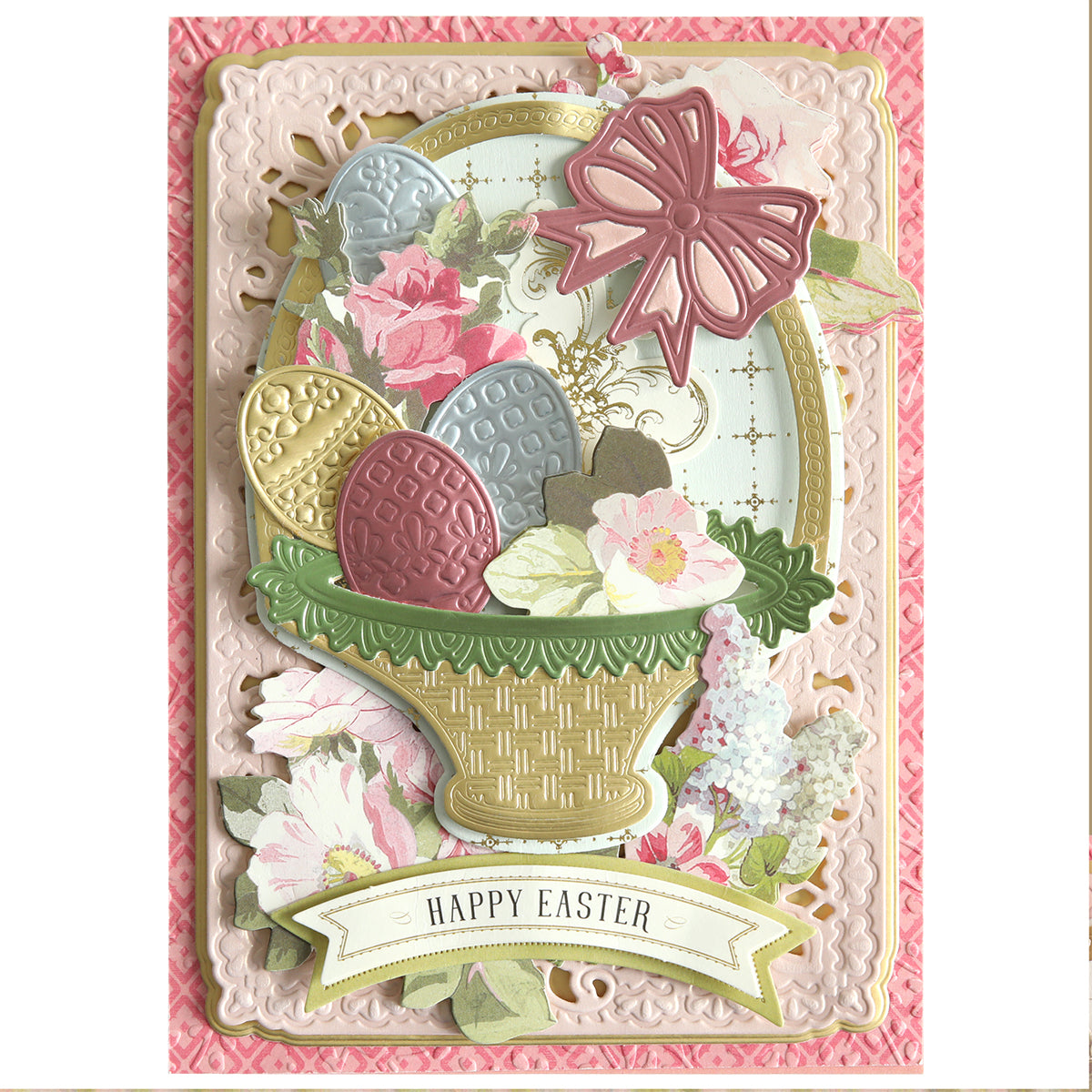 Create a charming idea sheet with "Happy Easter" using the Easter Scene Dies. They include an ornate card design featuring an Easter basket with colorful decorative eggs, surrounded by flowers and a bow. Perfect for capturing the spirit of the holiday!.