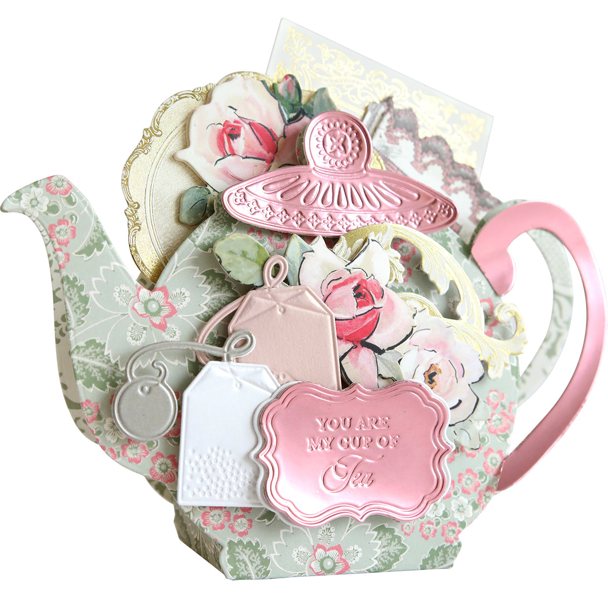 A card shaped like a decorative teapot adorned with floral patterns, tags, and a pink plaque declaring "You Are My Cup of Tea" pairs perfectly with Teapot Box Dies filled with delightful treats.