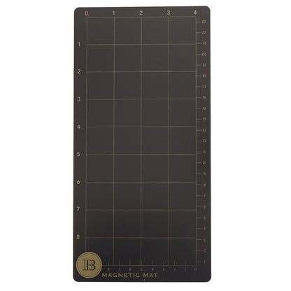 Rectangular black magnetic mat with a grid numbered 0–4 (top) and 0–15 (side), perfect for aligning die cutting plates like the Empress Elite Mini 5" x 10" Full Plate Set. Features a gold "PB" logo in the bottom left corner.