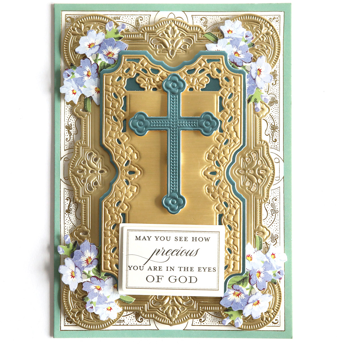 Decorative card featuring a gold and teal cross with floral embellishments. Text: "May you see how precious you are in the eyes of God." Heartfelt message enhanced by the uplifting Beautiful Blessings Sentiment Stickers.