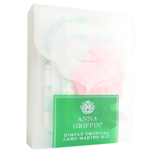 A translucent envelope labeled "Simply Tropical Card Making Kit" reveals vibrant card materials and 3D embellishments inside—ideal for crafting colorful handmade cards.